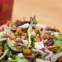 Greek Triton Salad · power greens blend, feta, fire roasted tomatoes, cucumbers, red onions, kalamata olives, cri...