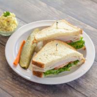 Turkey Sandwich · Thinly sliced roasted turkey breast with lettuce, tomato slices and mayo.