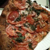 Old School Pizza · Fresh sliced tomatoes, sauce, Romano cheese and fresh basil.