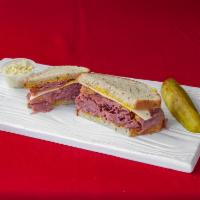1. Corned Beef and New York Pastrami Club Sandwich · Served with Swiss cheese, onion with Dusseldorf mustard on rye bread.