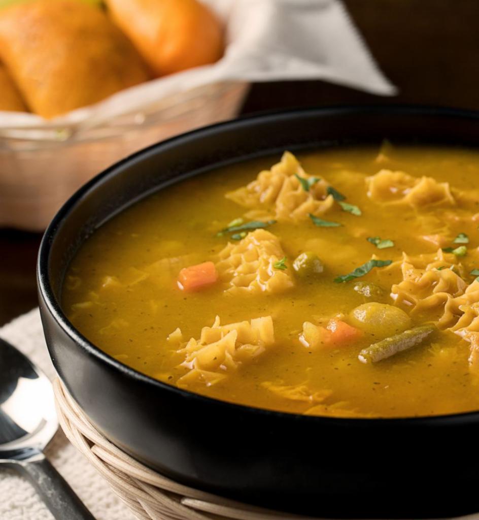 Mondongo con Arroz · Tripe soup with rice.