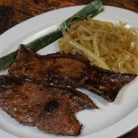 Higado a la Plancha · Grilled liver steak.