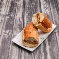 Turkey and Cheese Hoagie · Gourmet oven roasted turkey breast and NY American. Served with oil and seasonings. Served w...
