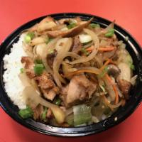 Dragon Chicken Bowl · White meat chicken, green peppers, onion and carrots with a spicy soy-sesame sauce over whit...