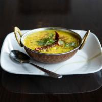 Tadka Daal · Yellow lentils in herbs and spices, cooked with onions, ginger and garlic.