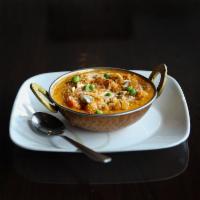 Navratha Korma · A royal entree, 9 vegetables cooked in mild creamy sauce, sprinkled with dry nuts.