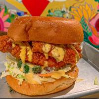 The Nash · Two hand breaded tenderloins dipped into our Nashville hot chicken mix, coleslaw, homemade p...
