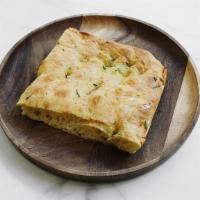 Housemade Focaccia · Genovese-style focaccia topped with rosemary and sea salt.