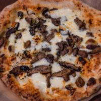 Mr. Porcini Pizza · Four different kind of mushrooms (Porcini, Shiitake, White & Oyster Mushrooms) all sauteed t...