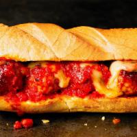 Meatball Sandwich · Meatballs in Marinara sauce and Provolone cheese, EVO, Quartered Dill Pickle