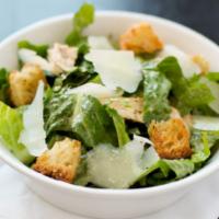 Caesar Salad · Romaine lettuce. Shaved Parmesan and Croutons.