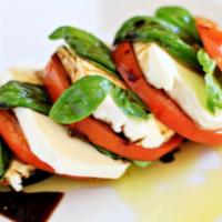 Caprese Salad · Fresh mozzarella, tomato and basil drizzled with Balsamic Vinegar & Olive oil (EVO)- Vegetar...