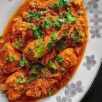 Chicken Quorma · Mild curry with Chicken braised in a yogurt and seasoned with mild aromatic spices like card...