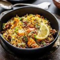 Vegetable Biryani · Long-grained rice  (basmati) flavored with fragrant spices such as saffron and layered with ...