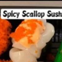 Spicy Scallop Maki · Chopped scallops, tobiko, cucumber and spicy mayo.