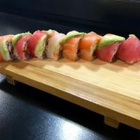 Rainbow Maki · Crab stick, cooked shrimp, tobiko and spicy mayo topped with a layer of tuna, salmon, tai fi...