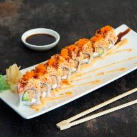 Red Sox Maki · Cooked salmon, avocado and cream cheese topped with spicy seafood salad, eel sauce and tobik...