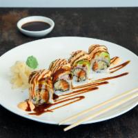 Hoshiya Maki · Salmon and tempura crumb topped with crab stick, topped with eel, avocado, spicy mayo and ee...
