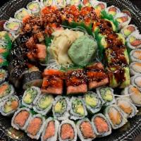 Makimono Party Tray · 65 pieces. Includes spicy tuna maki, Alaskan maki, Red Sox maki, black widow maki, spicy esc...