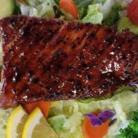 Salmon Salad · Grilled sushi-grade Atlantic salmon, spring romaine mix, corn, cucumbers, mango, edamame, on...