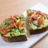 Avocado Toast · Thick country bread, olive oil, avocado, heirloom cherry tomatoes, chia seed, salt and black...