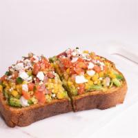 Mexi-Avocado Toast · Thick country bread, olive oil, avocado, corn, pico de gallo, feta cheese, lemon pepper and ...