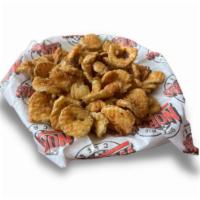 Fried Pickles · Dill pickle chips lightly battered and fried golden brown, served with homemade ranch dressi...