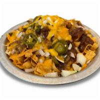 Texas Frito Pie · Fritos covered with cheddar cheese, Texas cafe chili, jalapenos and onions. 