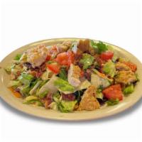Crispy Chicken Chopped Club Salad · Crispy chicken, bacon, boiled eggs, tomatoes and homemade croutons. Chopped and tossed in ou...