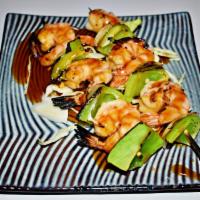 Shrimp Yaki Tori · 2 pieces. Grilled shrimp and vegetables on skewers served with teriyaki sauce.