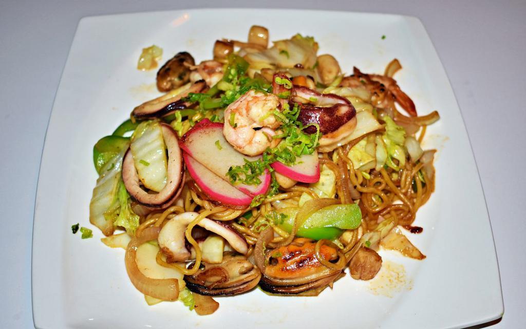 Seafood Yaki Noodle · Pan fried noodle in vinegary sauce with vegetables and mixed seafood.