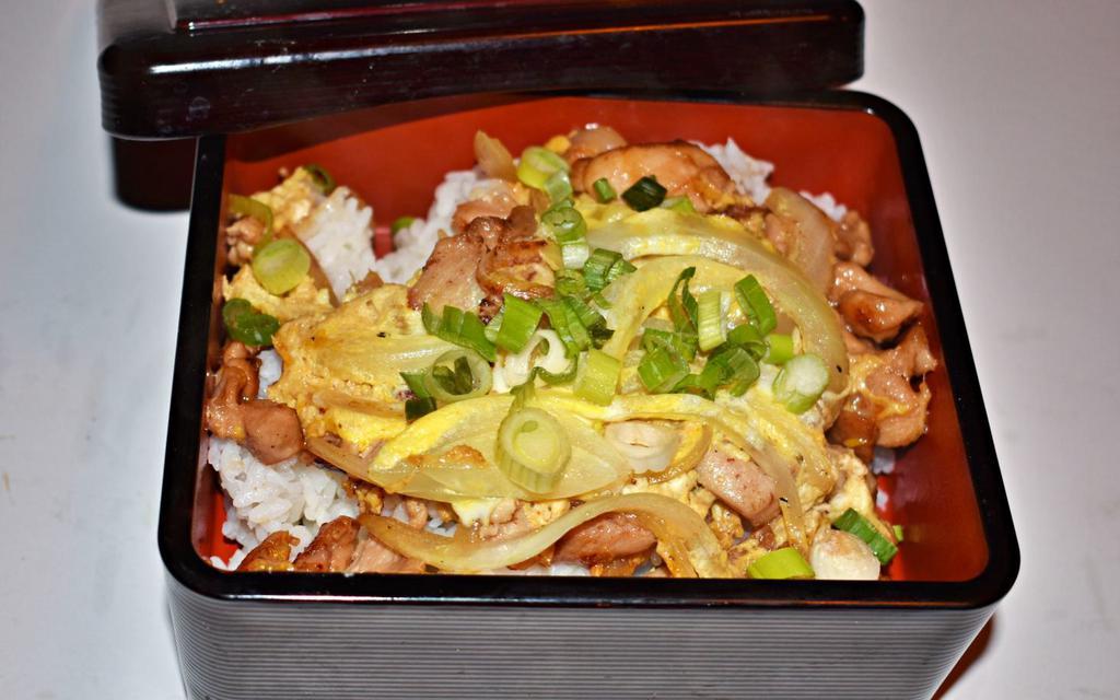 Oyako Don · Chicken, egg and vegetables simmered with sauce over rice.