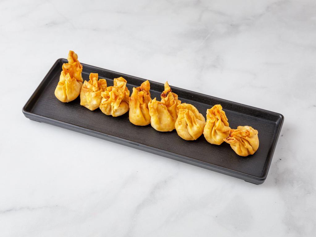 17. Crab Rangoon · Fried wonton wrapper filled with crab and cream cheese.