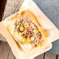 Hot Italian Beef Sandwich · Hot Sub
House roasted beef sliced thin and piled high. Topped with giardiniera peppers serve...