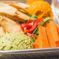 Hummus Duo · Vegan. Roasted jalapeno hummus and roasted carrot hummus, served with crostinis and carrots.