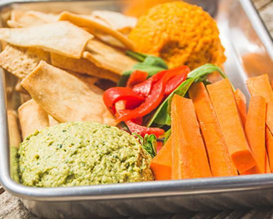 Hummus Duo · Vegan. Roasted jalapeno hummus and roasted carrot hummus, served with crostinis and carrots.