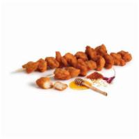Hot Honey Boneless Chicken Wings · 8 pieces of delicious breaded spicy honey chicken