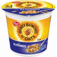Honey Bunches w Almonds 2.25oz · The crispy flakes and crunchy oat bunches you love – plus sliced almonds for a satisfying br...
