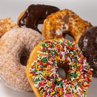 Assorted Donuts · A tasty variety of 6 or 12 assorted fresh homemade donuts.