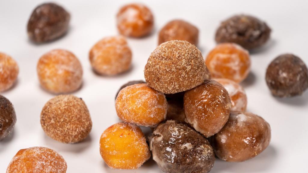Assorted Donut Holes · A mixed assortment of Ma’s delicious fresh specialty Donut Holes.