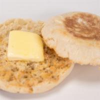 English Muffin with Butter · Perfectly toasted English muffin served with butter.
