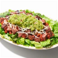 Keto Salad Bowl · Supergreens Lettuce Blend, Steak, Tomatillo-Red Chili Salsa, Cheese and Guacamole
