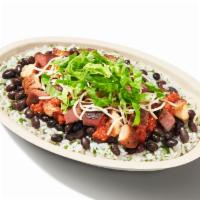 High Protein Bowl · White Rice, Chicken, Steak, Black Beans, Tomatillo-Red Chili Salsa, Cheese and Shredded Roma...