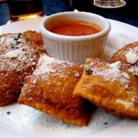 Fried Ravioli · 4 pieces of breaded cheese ravioli served with pomodoro sauce.