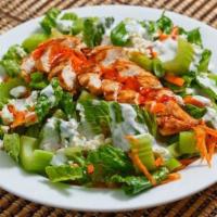 Buffalo Chicken Salad · Romaine lettuce tossed with blue cheese dressing, carrots and celery. Topped with 