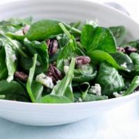 Spinach Gorgonzola Salad · Baby spinach tossed with a raspberry vinaigrette and topped with Gorgonzola cheese, tomatoes...