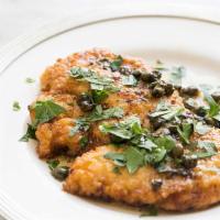 Chicken Picatta · Medallions of chicken simmered with artichoke hearts and capers in a white wine, lemon basil...