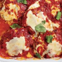 Meatballs · Prepared Parmigiana style with pomodoro sauce and melted mozzarella.