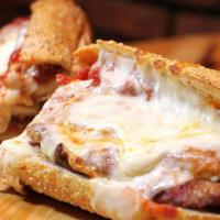 Chicken Parmigiana Hero · In house made chicken breast cutlet in our famous marinara sauce oven baked with mozzarella ...