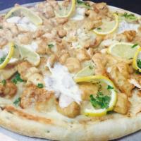 Chicken Francese Pizza · Flour-dredged, egg-dipped, sautéed chicken with a lemon-butter and white wine sauce
